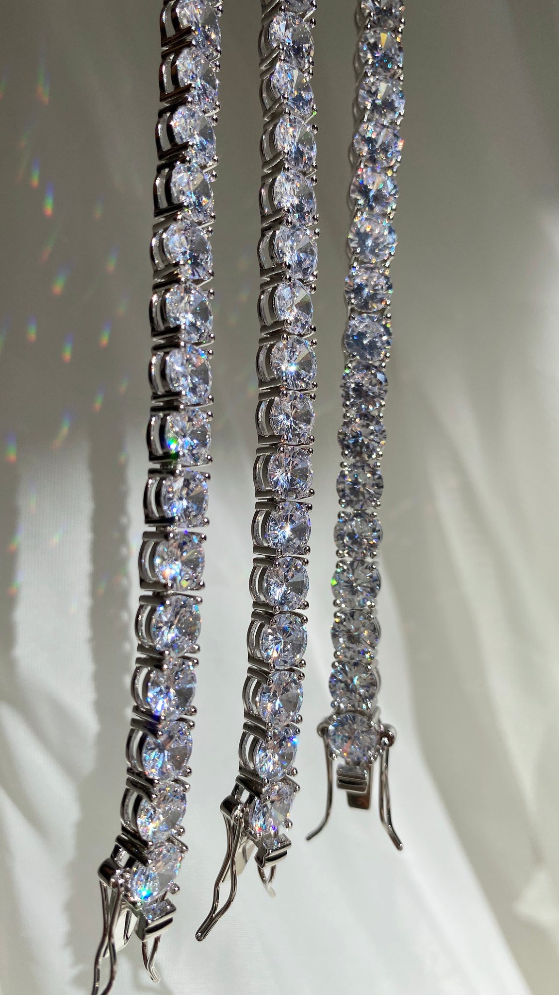 Tennis Bracelet  Available in 7 inches or 7.5 inches ( Please measure wrist before purchasing/ all sales are FINAL )  7mm  14k Gold Plated  Extremely High quality Brass ( Please keep away from water and fragrances to maintain shine )  High Grade AAAAA Cz (Simulated diamonds)  Each Bracelet Sold Separately. 