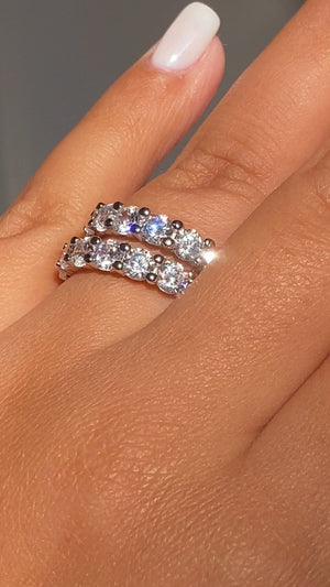 Ring Set (Comes with 2 separate Rings of the SAME size)  Round Cut  925 Sterling Silver  4mm High Grade AAAAA Cz (Simulated diamonds)  ( Please measure fingers before purchasing/ all sales are FINAL )  Rings sold as a set of 2.   